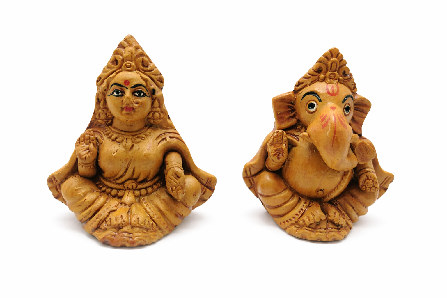 Two brown clay figurines on a white background